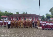Kadis Lingkungan Hidup Nias Utara Buka Tahun Ajaran Baru  di SDN 076681 Bahosea