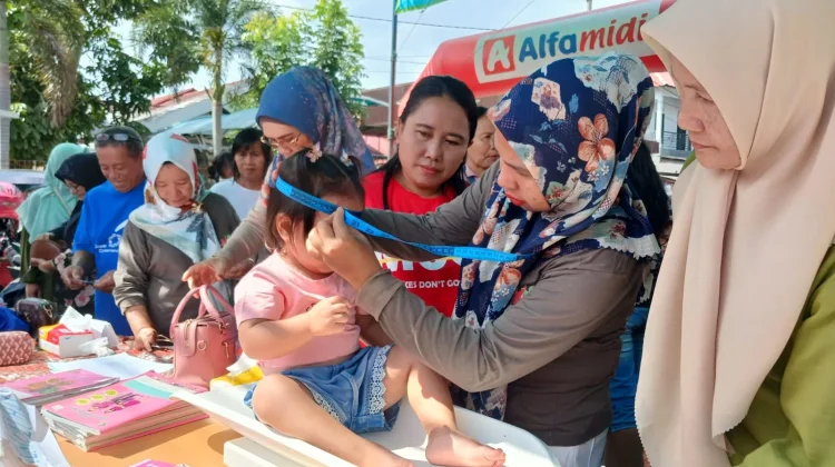 Alfamidi Dorong Orang Tua di Kotamobagu Lewat Edukasi Keluarga Balita
