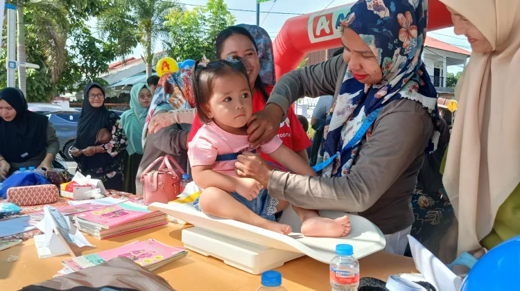 Alfamidi Dorong Orang Tua di Kotamobagu Lewat Edukasi Keluarga Balita