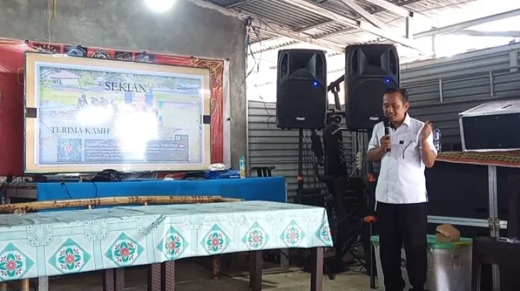 Tebar Benih Ikan Nila Program PWI Minut