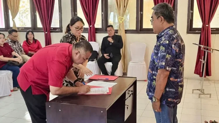 Serah Terima Jabatan Camat Dimembe
