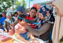 Alfamidi Dorong Orang Tua di Kotamobagu Lewat Edukasi Keluarga Balita