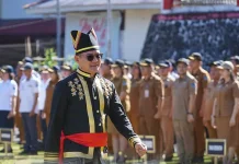 Pemkab Minut Gelar Upacara Harganas, Pejabat Gunakan Pakaian Tradisonal Minahasa