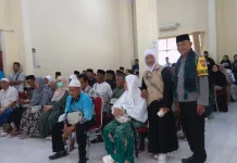 Bhabinkamtibmas Kawal Jamaah Haji Merauke