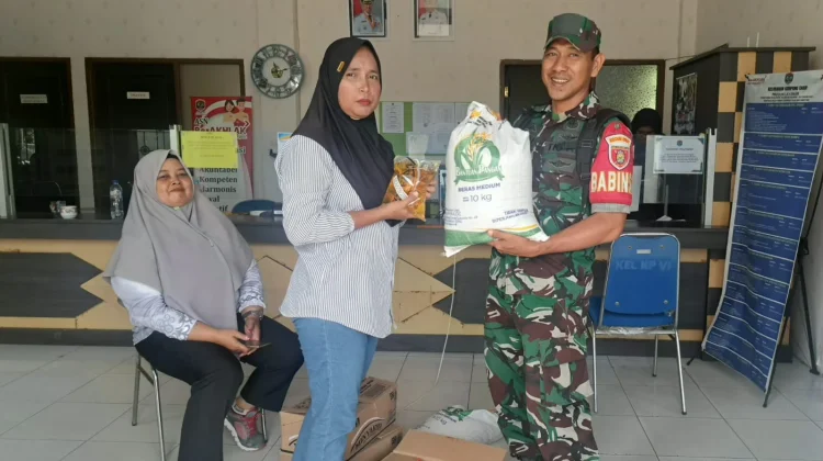 Sebanyak 737 KK Terima Bantuan Pangan di Kampung Enam