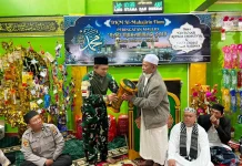 Satgas yonif 511/DY dan Umat Muslim Tiom Peringati Maulid Nabi 1448 H