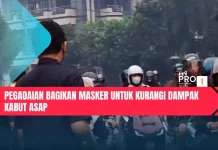 Pegadaian Bagikan Masker untuk Kurangi Dampak Kabut Asap