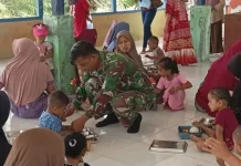 Babinsa Kawal Distribusi Makanan Bergizi Gratis Balita Simolap Subulussalam