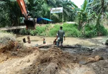 Sinergi TNI-Rakyat Percepat Jembatan Perintis Garuda Simpang Kiri