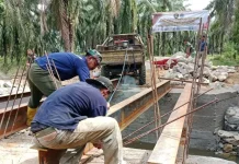 Kodim 0118 Subulussalam Jaga Kualitas Jembatan Garuda Demi Keamanan Warga
