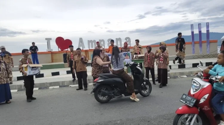 Aksi Nyata Pramuka Touna, Berbagi Takjil dan Menebar Kebaikan