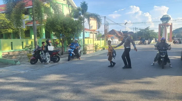 Tingkatkan Keamanan Lalu Lintas, Satlantas Polres Touna Gelar Strong Point Pagi