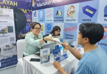 Kemenkum Sulteng Hadirkan Layanan KI On The Spot di HUT Sulteng