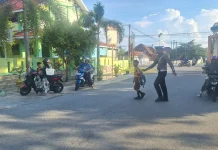 Tingkatkan Keamanan Lalu Lintas, Satlantas Polres Touna Gelar Strong Point Pagi