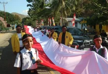 Bendera Merah Putih 81 Meter Membentang di Perbatasan RI-RDTL