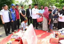 Pemkab Aceh Besar Bantu Korban Kebakaran di Darussalam