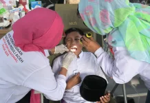 Dister AU dan Komunitas Lintas Agama Gelar Bakti Sosial Nyepi 1948 Saka di Lanud SIM