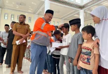 Solusi Bangun Andalas Berbagi Berkah Ramadan Bersama Anak Yatim