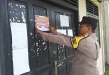 Polsek Sampoiniet Lakukan Pemasangan Brosur Imbauan Pencegahan Karhutla