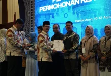 Kemenkum Aceh Serahkan Surat Register Sentra KI Bagi Perguruan Tinggi