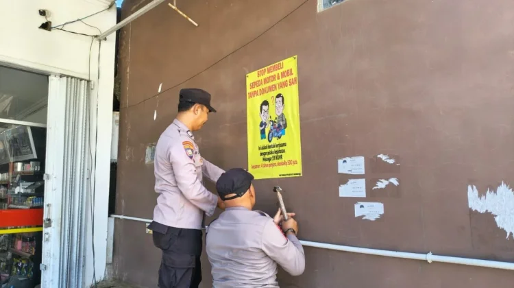 Polsek Kotabumi Kota Pasang Banner Imbauan Stop Membeli Kendaraan Bodong