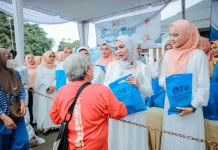 PKK  Lampung Bagikan Ratusan Paket Takjil kepada Masyarakat