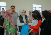 TP PKK Lampung Salurkan Bansos di Kota Metro