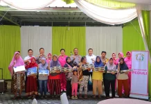 Polresta Bandar Lampung Distribusikan Ribuan Paket Kue Lebaran