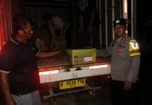 Polres Mesuji Kawal Distribusi Bibit Jagung ke Seluruh Kecamatan
