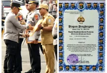 Bupati Pringsewu Raih Penghargaan dari Kapolda Lampung