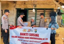 Hari Bhayangkara Polsek Simpang Pematang Salurkan Sembako Warga