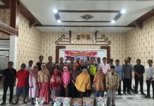 Polres Mesuji Bagikan Sembako untuk Warga Buko