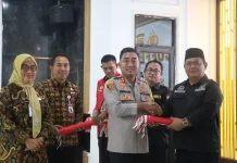 Kapolres Mesuji Serahkan Bendera kepada Sabuk Kamtibmas