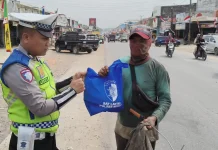 Satlantas Polres Mesuji Gelar Tasi Berkah bagi Warga Kurang Mampu