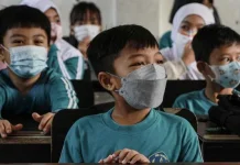 Cara Melindungi Anak dari Paparan Abu Vulkanik Anak Krakatau
