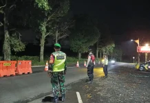Babinsa Koramil 0505/Tanjungsiang Ikut Amankan Jalur Lebaran