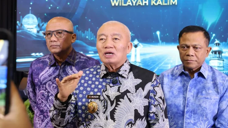 Gubernur H. Muhidin Dorong Masyarakat Transaksi Non Tunai QRIS