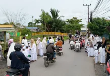 MI AL JIHAD SEMANDA MENGAJARKAN BERBAGI sejak DINI