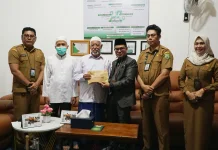 Dukung Program Baznas, Pegawai BPBD Balangan Salurkan Paket Ramadan Berkah