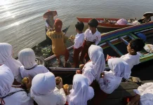 Arbainah Menjaga Tradisi dan Semangat Berbagi di Pasar Terapung Lok Baintan