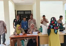 Polsek Cimarga Amankan Penyaluran Bantuan Pangan Pemerintah di Desa Tambak