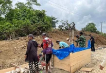 Satgas TMMD Kodim Buton Bersama Warga Percepat Pembangunan Drainase