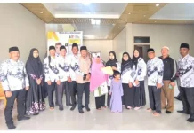 PGRI Bukit Batu Serahkan Bantuan Korban Kebakaran Guru