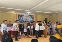 Bupati Kasmarni Serahkan CSR BRK Syariah di Bulan Ramadan