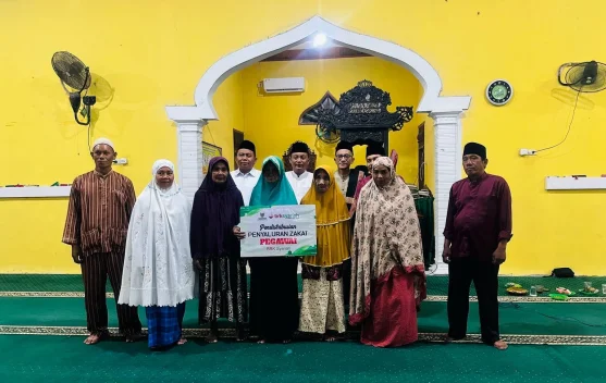 BRK Syariah Bengkalis dan Baznas Dorong Literasi Zakat saat Penyaluran Bantuan