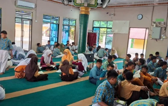 KUA Mandau dan SMPN 11 Mandau Gaungkan Gerakan Pemberantasan Buta Aksara Al-Qur'an