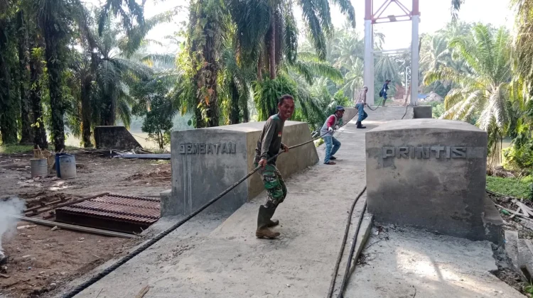 Pembangunan Jembatan Perintis Garuda  Desa Kuala Langi Terus Dipercepat