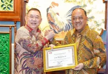 KONI Anugerahi Jerry Hermawan Lo Tokoh Peduli Olahraga