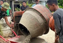 Yonif TP 858/MSB Gelar Karya Bakti Bersihkan Pasar Darfuar