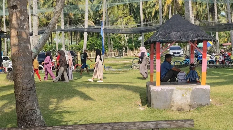 Keindahan Pantai Batu Karang Pangubaian Memikat Wisatawan
